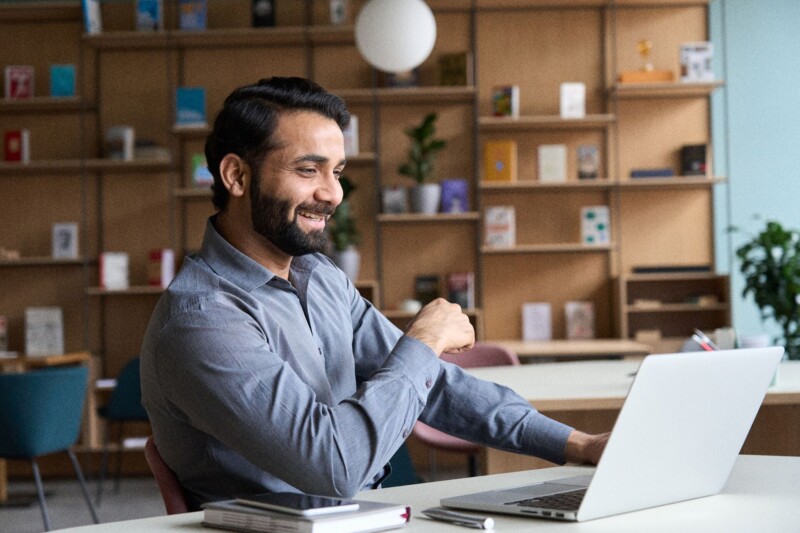Smiling man working in an office